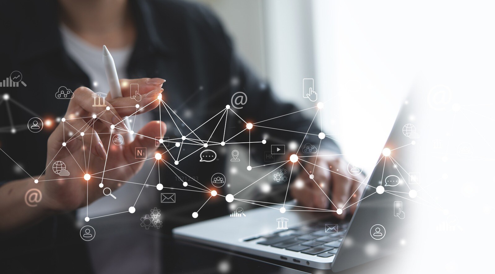 Illustration of network segmentation and connected systems over a laptop